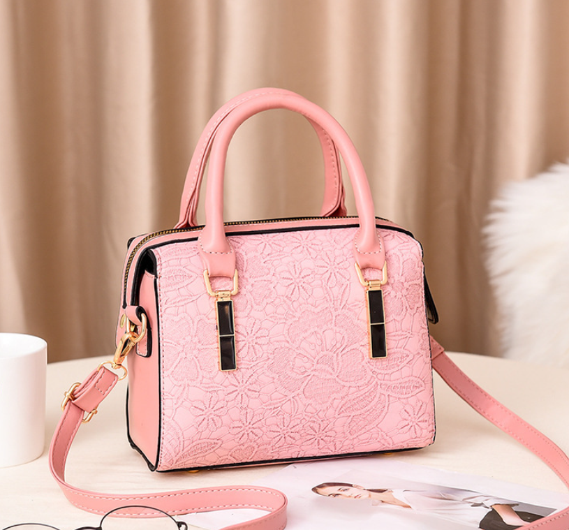 Жіноча сумка з тисненням квітами, міні сумочка-бочечка з квіточками Рожевий