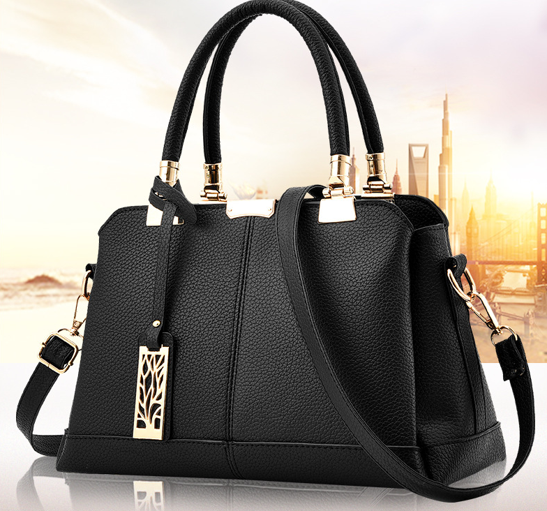 Модна жіноча сумка з брелоком, стильна велика жіноча сумочка екошкіра
